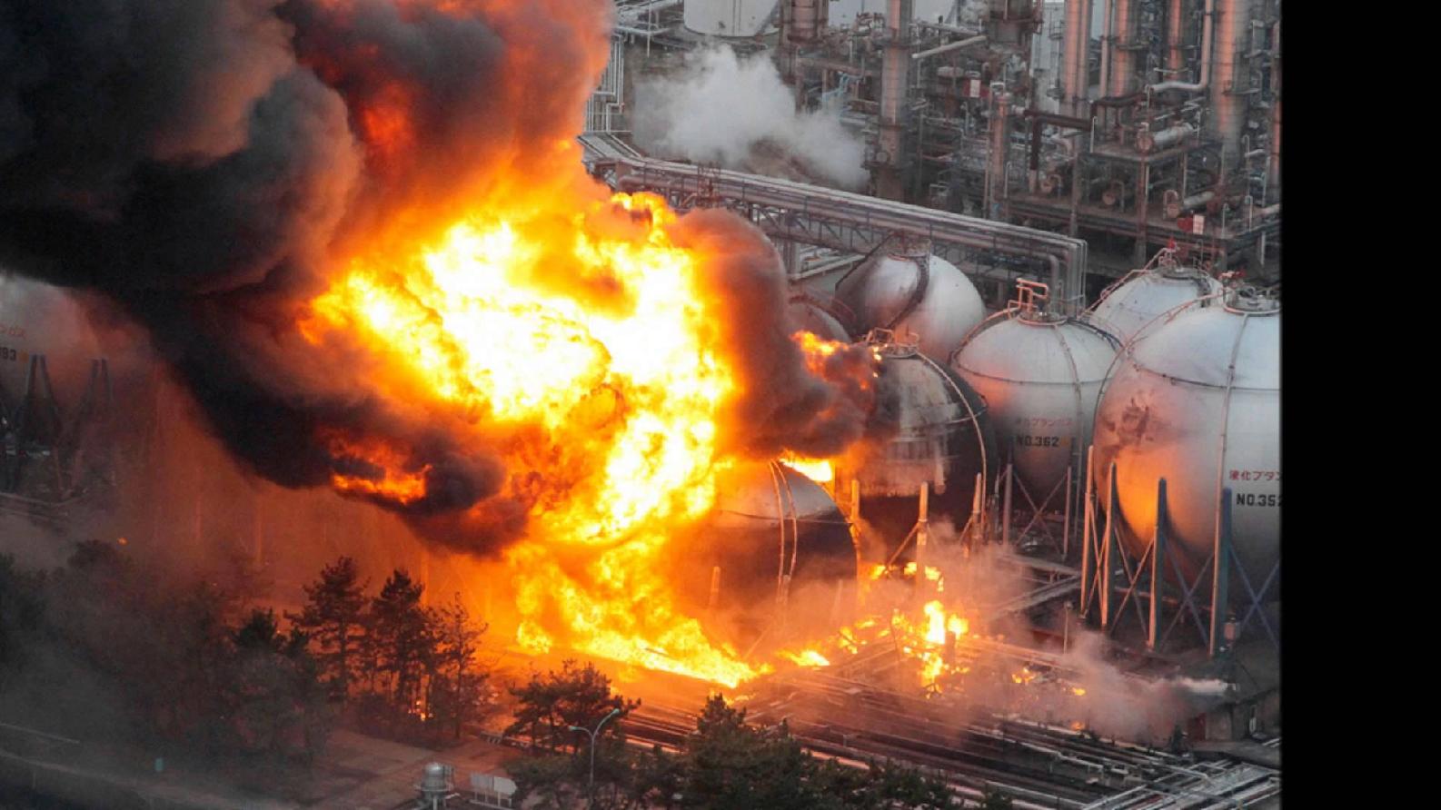 A picture containing text, fire, car bomb, transport
Description automatically generated