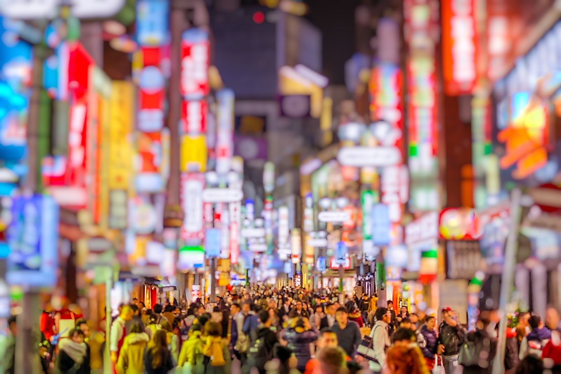 A crowd of people in a city
Description automatically generated with medium confidence
